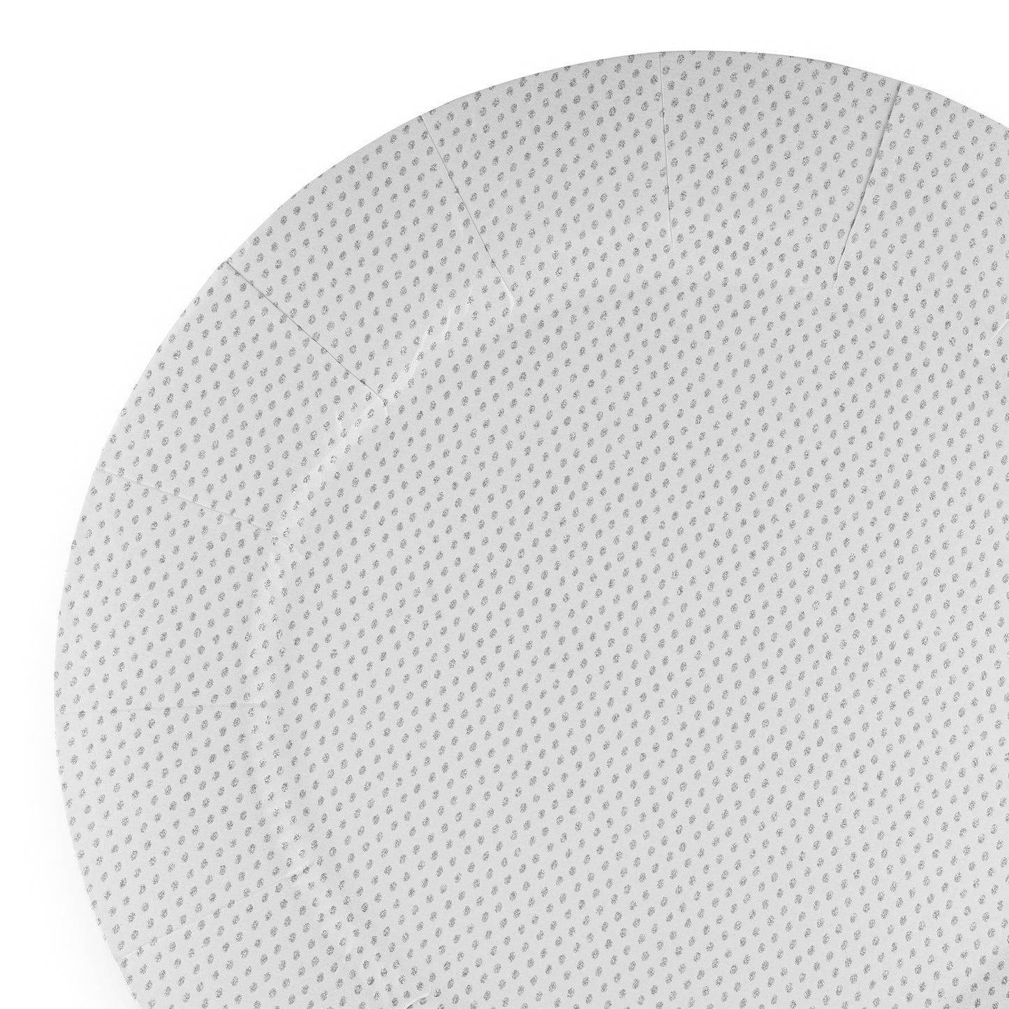 A close-up of a Glitz White Round Paper Charger Plate made from high-quality, durable paper material. The charger plate features a white background adorned with an evenly distributed gray polka dot pattern. The edges are slightly curved upwards, highlighting its elegant design.