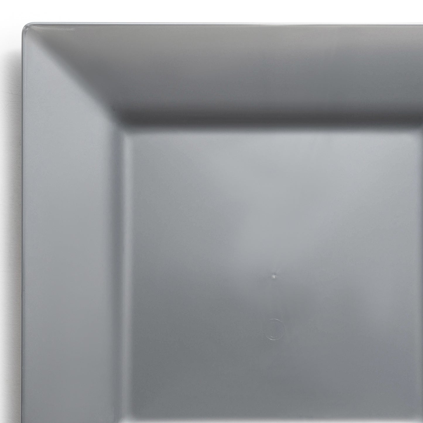 A close-up image of a square-shaped gray ceramic plate with a smooth and glossy surface. The plate's simple and minimalist design is emphasized, highlighting its clean lines and modern aesthetic, reminiscent of elegant Silver Square Disposable Plastic Salad Plates (6.5").