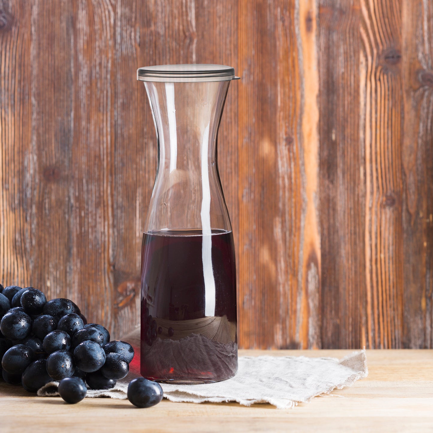 35 oz. Clear Large Plastic Disposable Wine Carafes with Lids