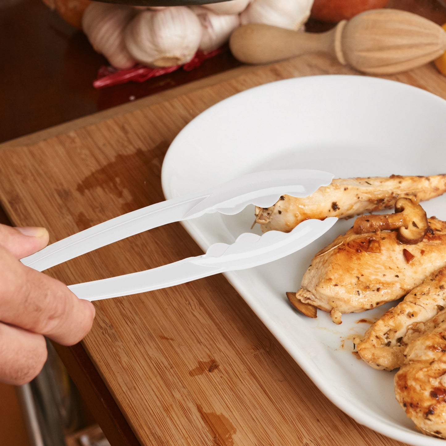 9" White Plastic Serving Tongs