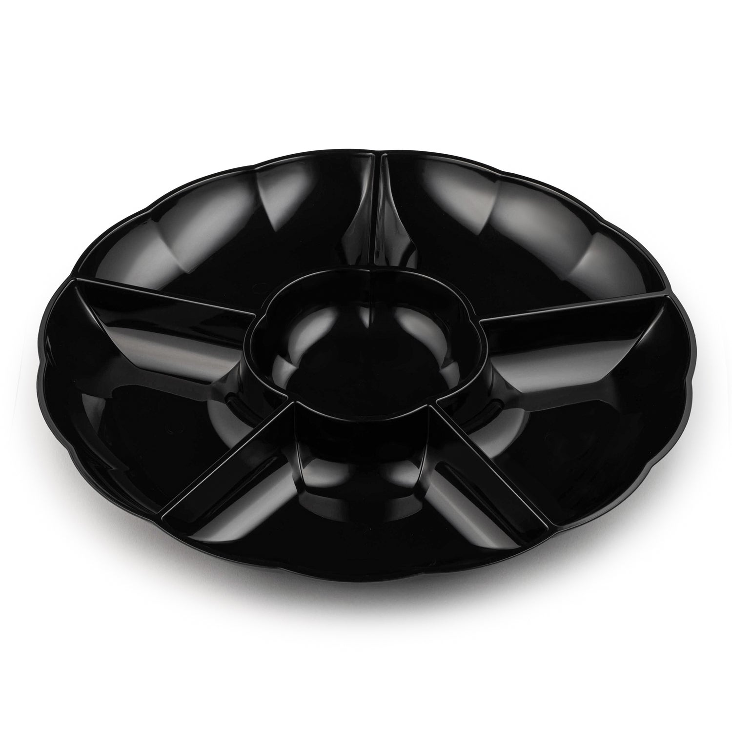 The Black Big 6-Partition Round Plastic Tray features a central circular compartment and six surrounding wedge-shaped compartments, all crafted from durable black plastic. With its slight scalloped edge, it is perfect for organizing and displaying different snack items, making it an ideal reusable tray for any gathering.