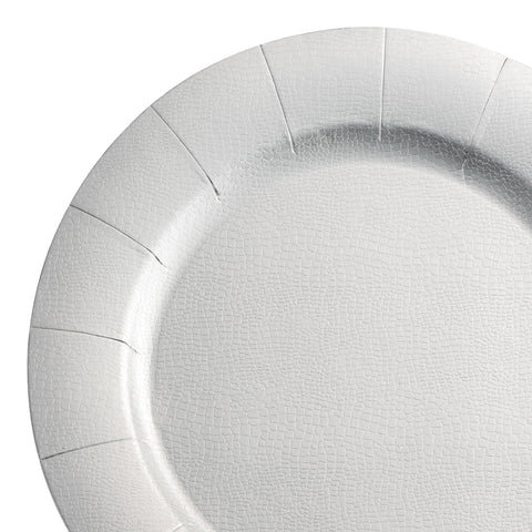 A plain, round, Shiny Silver Disposable Paper Charger Plate with a textured surface is shown. The plate features subtle grooves around its edge, giving it a slightly scalloped appearance. Perfect for an elegant table setting with the convenience of disposable paper plates. The background is isolated and white.