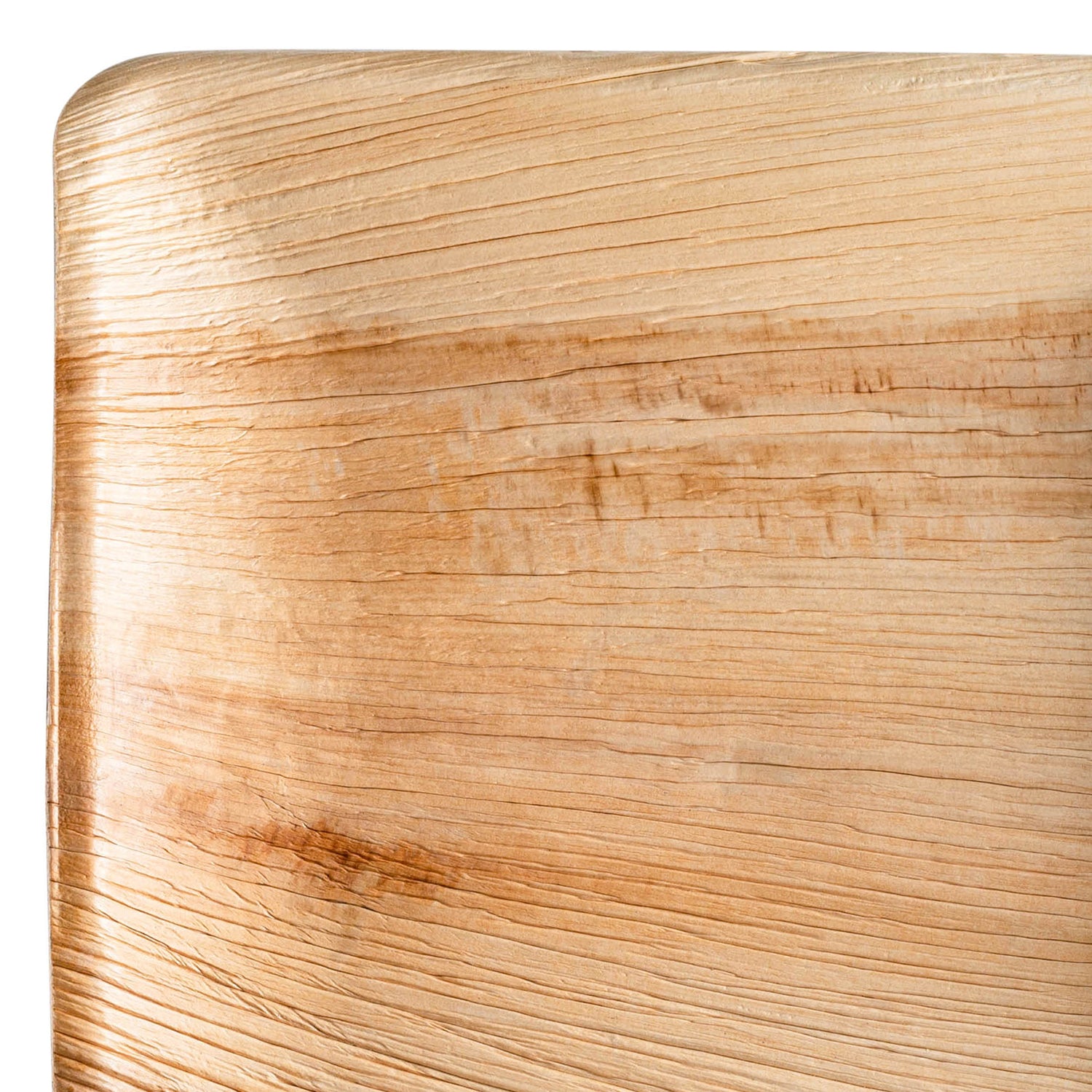 Close-up of the Square Palm Leaf Disposable Eco-Friendly Dinner Plates (10") showcasing a light-colored wooden surface with visible grains and natural textures. The palm leaf material has a smooth finish, subtle variations in color, and small imperfections that lend a rustic and natural charm similar to sustainable dinnerware. The edges of the plates are slightly rounded.