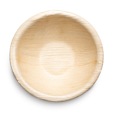 Introducing the Round Palm Leaf Disposable Eco-Friendly Soup Bowls (5.5 oz.), a light-colored, shallow dish crafted from sustainable materials. Each bowl boasts a subtle, textured surface with natural grains, perfect for serving food while promoting eco-conscious choices. Photographed against a plain white background, these bowls are an ideal option for those seeking green alternatives in their dining experience.