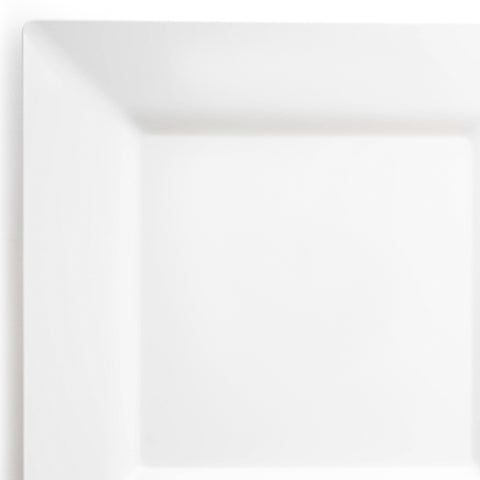 A square, white plastic pastry plate with a minimalist design is shown against a white background. The plate is clean and devoid of any food or decoration. The image highlights the simplicity and elegance of White Square Disposable Plastic Pastry Plates (4.5