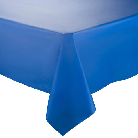 A close-up view of the corner of a table draped with a Navy Rectangular Plastic Tablecloth (54