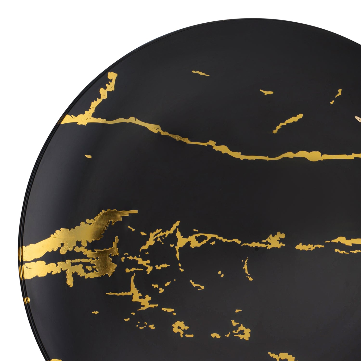 A close-up of one of the Black with Gold Stroke Round Plastic Disposable Dinner Plates (10.25") reveals an abstract design featuring irregular gold streaks and patches. The gold accents provide a striking contrast against the dark background, imbuing these disposable dinner plates with an elegant and modern look.