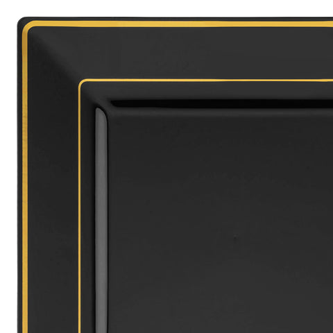 A close-up of a square black plate with a decorative gold rim. The corner of the Black with Gold Square Edge Rim Plastic Salad Plate (6.5