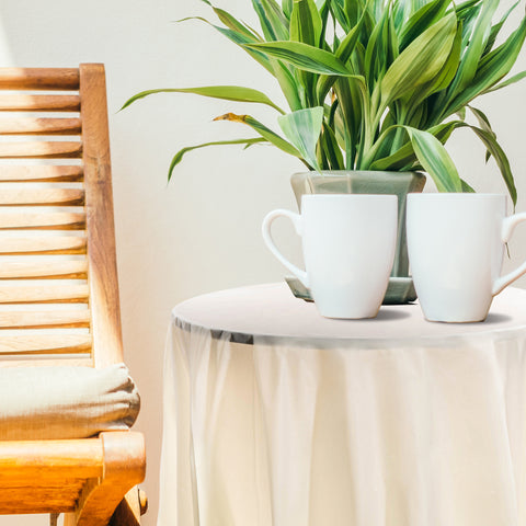 Ivory Round Plastic Tablecloths (84